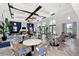 Elegant dining area with stylish furnishings, large windows, and tasteful decor creating a welcoming atmosphere at 12706 Cobalt Ter, Bradenton, FL 34211
