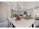Open concept dining room and living room that leads into the kitchen at 12706 Cobalt Ter, Bradenton, FL 34211