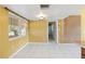 A bright dining area with tile floors and a large window for natural light at 1401 Francis Ave, Sarasota, FL 34232
