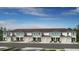 New townhomes with attached garages and manicured landscaping offer modern living at 15048 Cuzcorro Ct, Nokomis, FL 34275