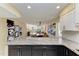Kitchen featuring granite counters, stainless appliances, and view to dining and living area at 1617 Bayhouse Ct # 121, Sarasota, FL 34231