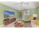 Relaxing living room with contemporary decor, a flat-screen TV, and ample natural light at 1617 Bayhouse Ct # 121, Sarasota, FL 34231