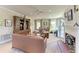 Bright and airy living room with a decorative fireplace, comfortable furnishings, and an inviting atmosphere at 1617 Bayhouse Ct # 121, Sarasota, FL 34231
