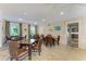 Spacious living room with wainscotting and comfortable seating, perfect for gatherings and relaxation at 1617 Bayhouse Ct # 121, Sarasota, FL 34231