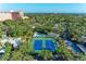 Overhead view of well-maintained community tennis courts, perfect for active residents and sports enthusiasts at 1617 Bayhouse Ct # 121, Sarasota, FL 34231