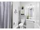 Inviting bathroom features vanity, framed mirror, linen closet, and nautical decor at 16309 Castle Park Ter, Lakewood Ranch, FL 34202