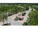 Community gatehouse surrounded by lush landscaping, ensuring privacy and security for residents at 16309 Castle Park Ter, Lakewood Ranch, FL 34202