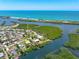 Waterfront property featuring beach access and a private dock for boating and waterside enjoyment at 1680 Lemon Bay Dr, Venice, FL 34293