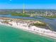 Expansive aerial view featuring the home's proximity to the ocean and a nearby beach at 1680 Lemon Bay Dr, Venice, FL 34293