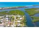 Lovely home with an inviting lawn close to a pristine waterfront with beach access at 1680 Lemon Bay Dr, Venice, FL 34293