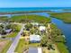 Beautiful aerial view shows location of the house close to the intercoastal and gulf waters at 1680 Lemon Bay Dr, Venice, FL 34293