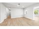 Spacious living room boasts tile floors, fresh paint, and an abundance of natural light at 1680 Lemon Bay Dr, Venice, FL 34293