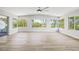 Bright and open living area featuring tile floors, large windows, and lots of natural light at 1680 Lemon Bay Dr, Venice, FL 34293