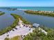Boat launch area with ample parking spots close to the ocean for convenient access at 1680 Lemon Bay Dr, Venice, FL 34293