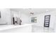 Bright, modern kitchen featuring stainless appliances, a white countertop island, and sleek fixtures at 18182 Steele Ave, Port Charlotte, FL 33948