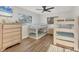 Bedroom showcasing bunk beds, a dresser, and natural light from the window at 2301 Cass St, Sarasota, FL 34231