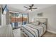 Bedroom featuring a sliding glass door that leads to a pool area at 2301 Cass St, Sarasota, FL 34231