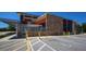 Modern architecture of the Gulf Gate Library, featuring brick accents and accessible parking spaces at 2301 Cass St, Sarasota, FL 34231