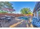 Inviting backyard pool area with comfortable seating, perfect for relaxation and entertaining at 2301 Cass St, Sarasota, FL 34231