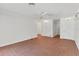 Bright bedroom with tile floors, a ceiling fan and ample closet space at 2410 Tanglewood Dr, Sarasota, FL 34239