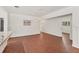 Dining area with modern hanging lights and views into other rooms at 2410 Tanglewood Dr, Sarasota, FL 34239