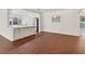Bright, modern kitchen with stainless steel appliances and breakfast bar at 2410 Tanglewood Dr, Sarasota, FL 34239