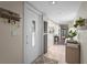 Bright foyer featuring tile flooring and an open view to living spaces at 2531 Riverbluff Pkwy # V181, Sarasota, FL 34231