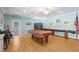 Bright and inviting game room featuring pool table and relaxing decor at 2531 Riverbluff Pkwy # V181, Sarasota, FL 34231