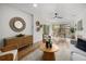 Inviting living room with natural light, stylish decor, and an open layout leading into the dining area at 2535 Floyd St, Sarasota, FL 34239