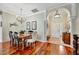 Dining area showcasing wood floors, natural lighting, and architectural details at 3103 77Th E Dr, Sarasota, FL 34243