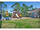 A community playground provides a safe place for fun and outdoor exercise at 3103 77Th E Dr, Sarasota, FL 34243