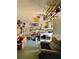 Multipurpose basement featuring a laundry area, storage, and seating area at 3325 Honeymoon Ln, Holiday, FL 34691