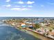 Waterfront home on canal with boat dock and stunning water views under a blue sky with white clouds at 377 22Nd Se Ave, St Petersburg, FL 33705