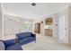 Bright living room with double doors, large windows, and a built-in bar area at 4730 Old Farm Rd, Sarasota, FL 34233