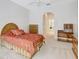 Inviting main bedroom with neutral tones, ample storage, and an ensuite bathroom at 4730 Old Farm Rd, Sarasota, FL 34233