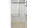 Organized walk-in closet featuring custom shelving and ample hanging space for clothing and accessories at 4730 Old Farm Rd, Sarasota, FL 34233