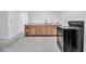 Kitchen area with light-colored cabinets and stainless-steel sink, next to oven at 4918 Lahaina Dr, Sarasota, FL 34232