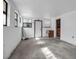 A view of a room that includes some windows, and doors and an unpainted floor at 4918 Lahaina Dr, Sarasota, FL 34232