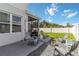Backyard featuring a patio with seating area and fire pit, great for entertaining at 5514 Spanish Moss Cv, Bradenton, FL 34203