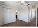 Neutral bedroom with double closet, carpet, and ensuite access at 5526 River Sound Ter, Bradenton, FL 34208