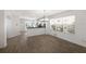 Bright dining room with hardwood floors, and open access to the kitchen at 5526 River Sound Ter, Bradenton, FL 34208