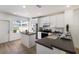 Modern kitchen with stainless steel appliances, granite countertops, and island at 5526 River Sound Ter, Bradenton, FL 34208