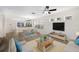 Bright living room featuring hardwood floors, dining area, and plenty of natural light at 5526 River Sound Ter, Bradenton, FL 34208