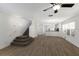 Bright living room featuring hardwood floors, and staircase to the second floor at 5526 River Sound Ter, Bradenton, FL 34208
