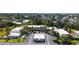 Aerial view showcasing the community, lush greenery, and surrounding lakes at 564 Lakeside Dr # 564, Bradenton, FL 34210
