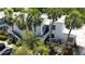 Aerial of condo with patio furniture and grill on a sunny day at 564 Lakeside Dr # 564, Bradenton, FL 34210