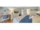 Serene bedroom showcasing a cozy bed, sleek TV, and a charming vanity area for a tranquil retreat at 564 Lakeside Dr # 564, Bradenton, FL 34210