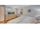 Serene bedroom offering a peaceful retreat with a comfortable bed, scenic TV, and soft natural light at 564 Lakeside Dr # 564, Bradenton, FL 34210