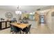 Modern dining area situated next to kitchen and home entrance at 564 Lakeside Dr # 564, Bradenton, FL 34210