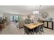 Inviting dining room adjoins to living room and lanai, perfect for entertaining at 564 Lakeside Dr # 564, Bradenton, FL 34210